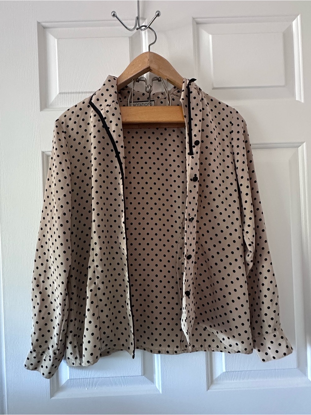 Notations Black Polka Dot Blouse on Beige Background